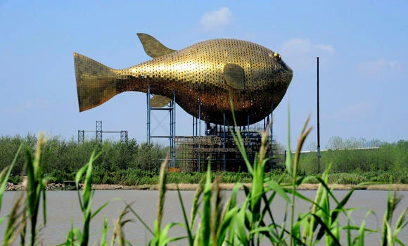 China puffer fish tower prompts a huff about state spending