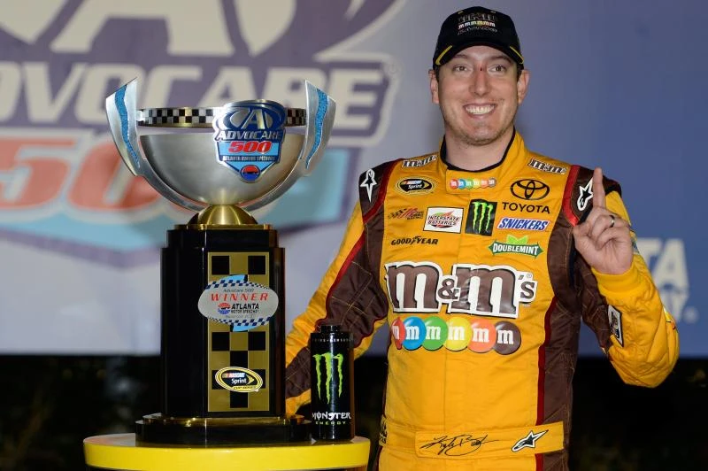 Busch claims Atlanta race, locks up Chase spot