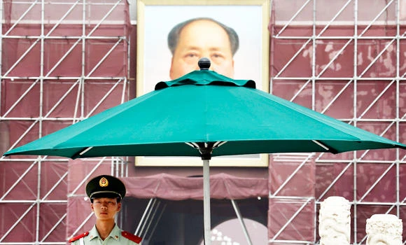 China indicts six in custodial death