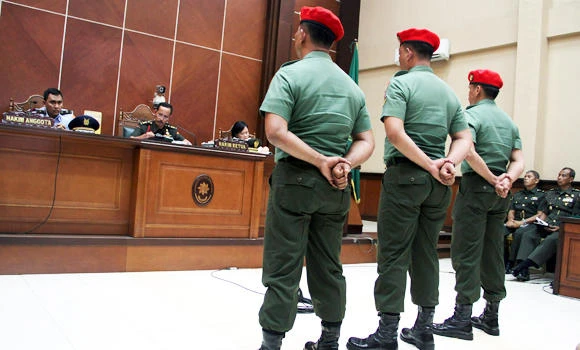 Indonesia jails 4 more soldiers for prison killing