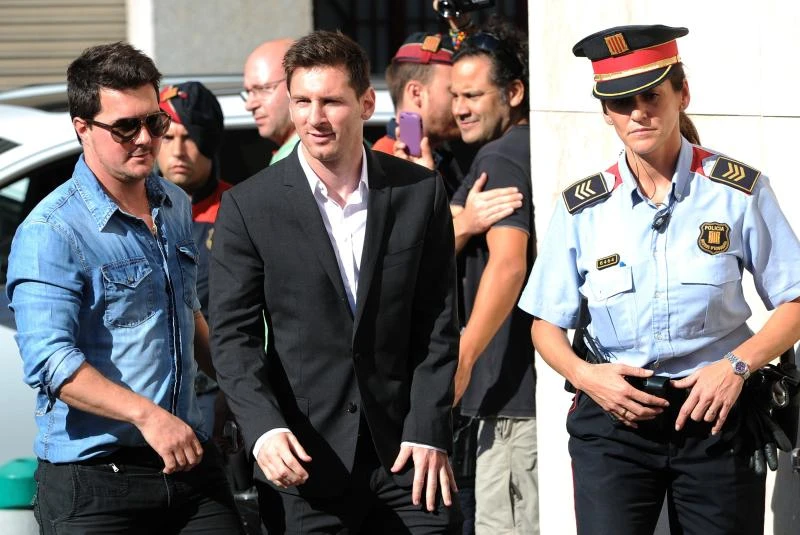 Messi answers tax charges in court