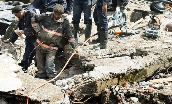 One held over Mumbai building collapse as death toll rises to 60