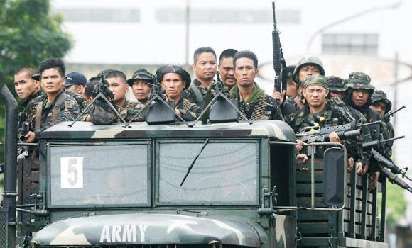 Philippine president calls on rebels to surrender