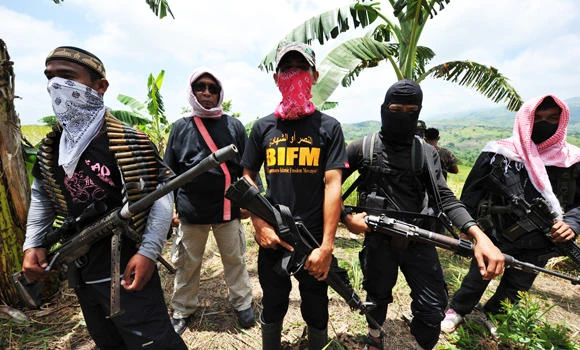 Filipino rebels opposed to talks attack southern town
