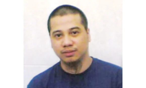 Former death row Filipino flies home