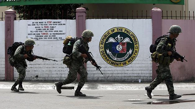 Eight die as Filipino rebels strike again