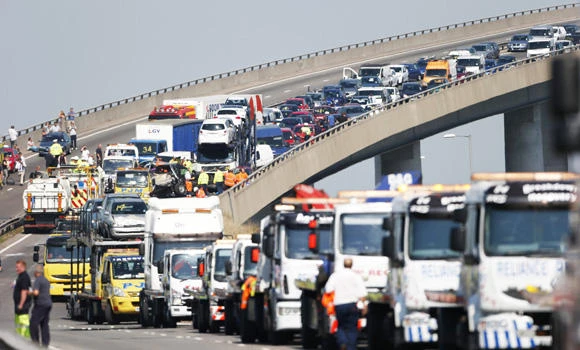 Up to 100 cars in UK pileup on fog-shrouded bridge