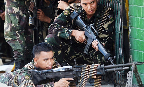 Filipino rebels in standoff seek international mediation