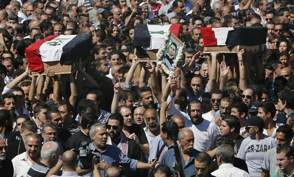 Battles rage on in Syria Christian town
