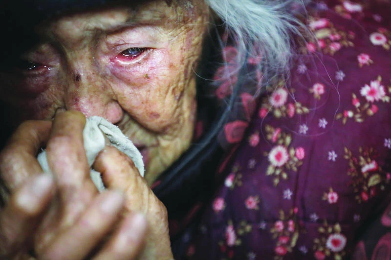 In aging China, old lady sues children for neglect