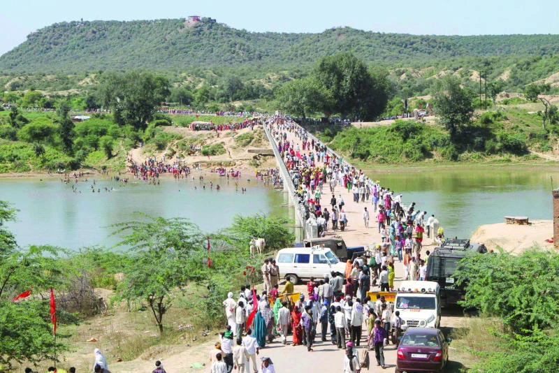 Police, officials suspended over deadly India stampede