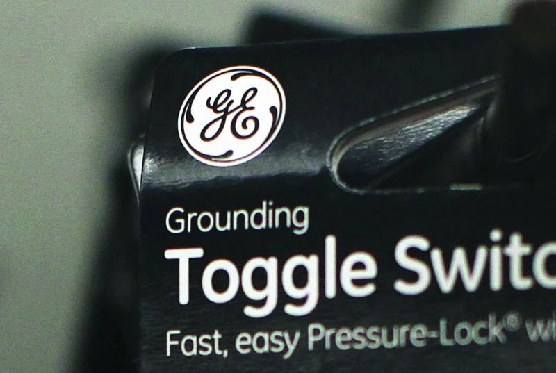 GE posts 9% profit drop but beats forecasts