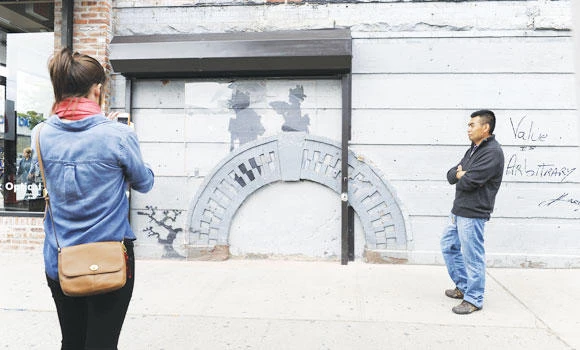 Guards posted to protect Banksy street art in NYC