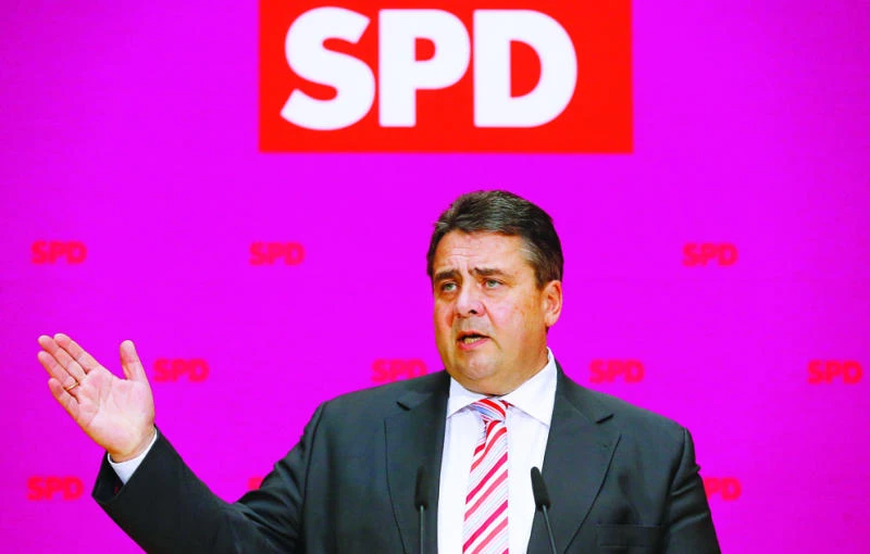Germany’s SPD back coalition talks with Merkel on conditions
