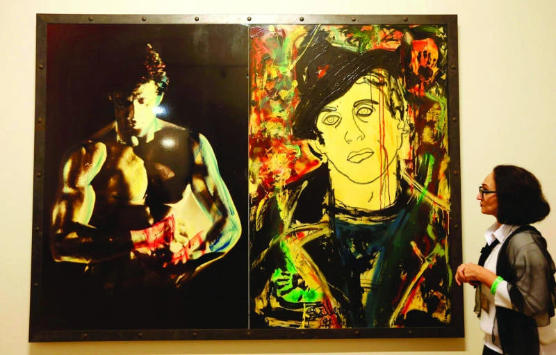 Action star Stallone shows off artistic side in Russia