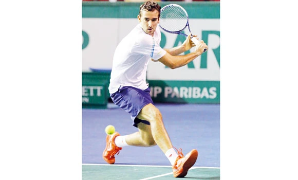 Cilic returns to winning ways following ban