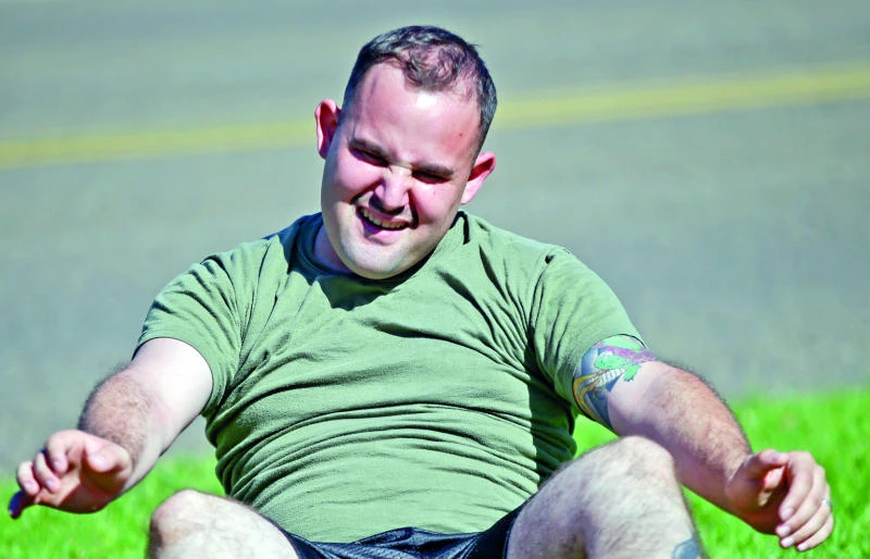 US troops turn to liposuction to pass fat test
