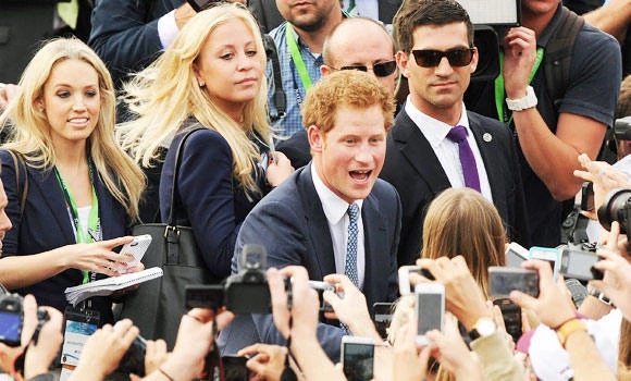 Prince Harry blames work pressure for brief Oz visit