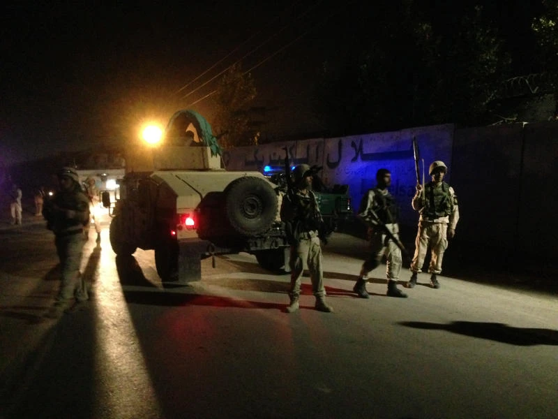 Afghan insurgents hit convoy by foreigner compound