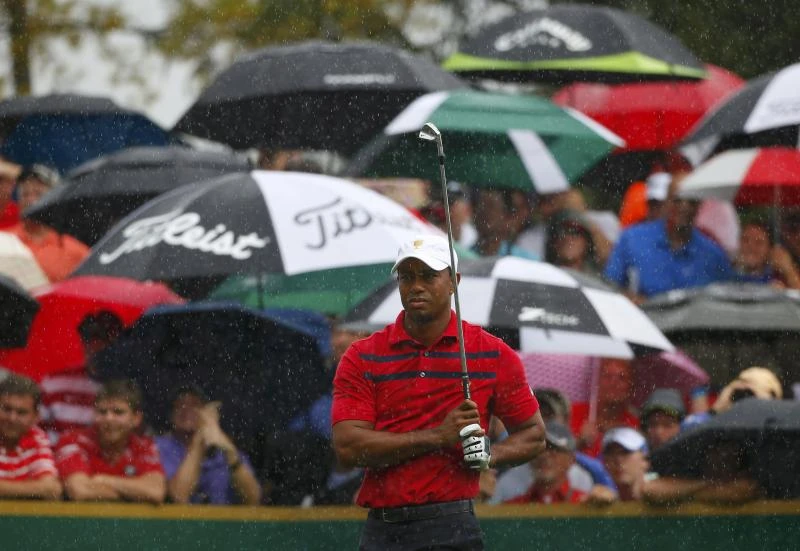 US in charge as downpours soak course to halt Presidents Cup