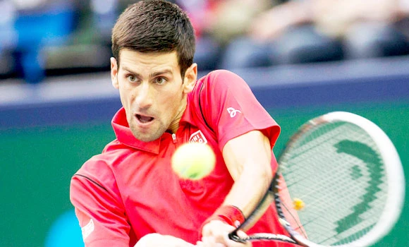 Djokovic romps to victory despite injury scare