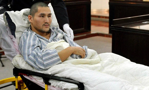 Beijing wheelchair bomber jailed for six years