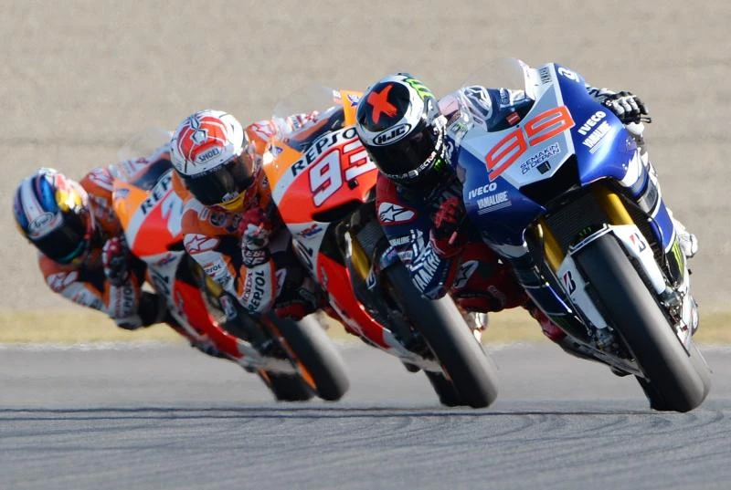 MotoGP championship down to final race as Lorenzo triumphs