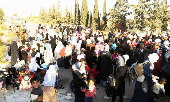 1,500 evacuated from Damascus suburb