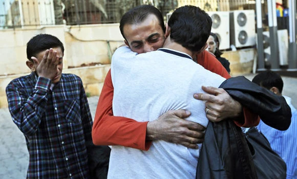 Amnesty urges Egypt to stop detaining Syrian refugees