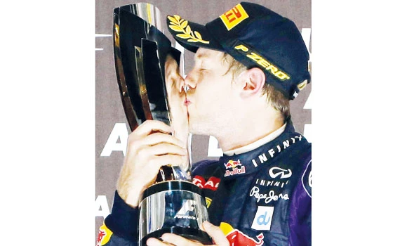 Dominant Vettel in seventh heaven