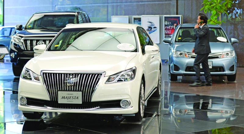 Toyota closes in on record profit as rivals face expansion pain