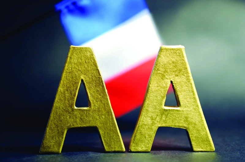 France under pressure to push reforms after rating downgrade