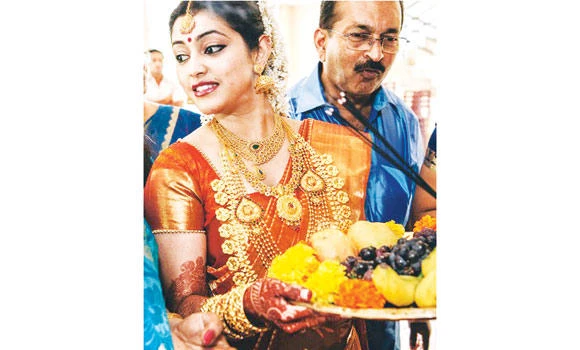 Gold-laden Indian brides defy prime minister as culture triumphs