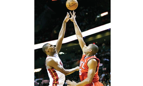 Heat use big third quarter to crush Hawks