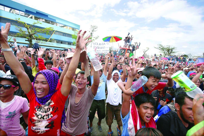 Filipino typhoon survivors cheer Pacquiao triumph