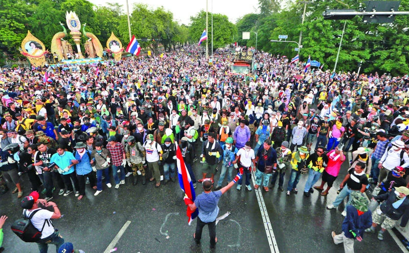 Thai PM tightens security as protests escalate
