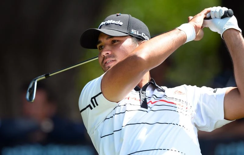 Day fires 66 to lead World Cup by 1