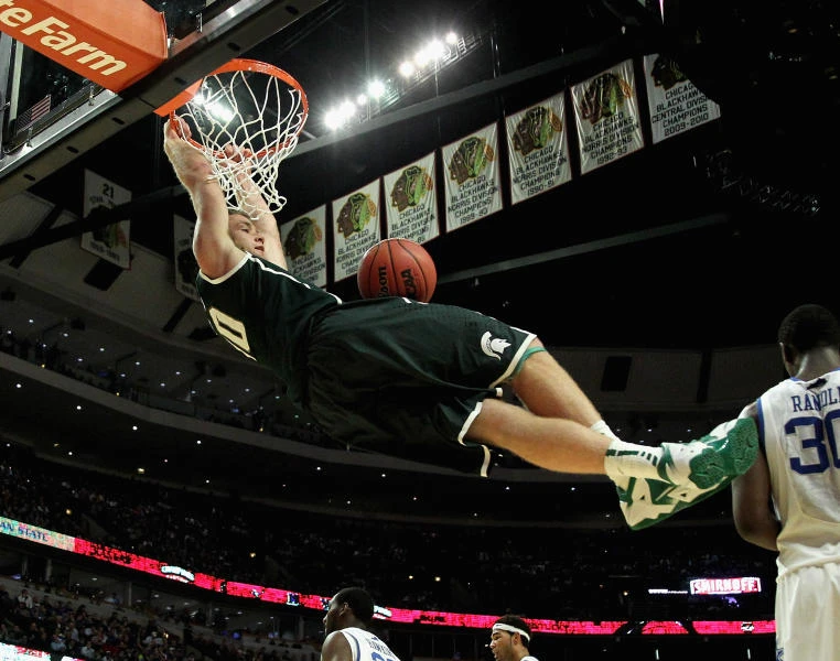 No. 2 is No. 1 as Spartans tame Wildcats 78-74