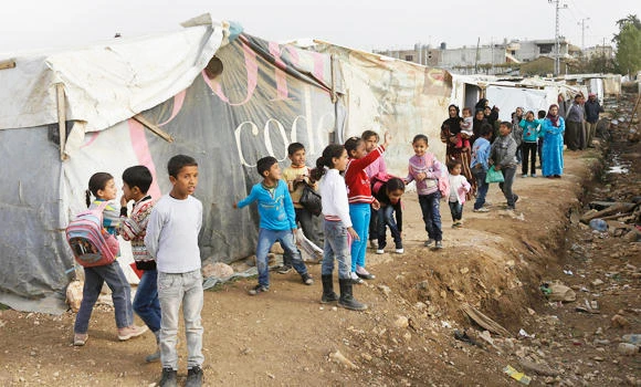 Thousands seek refuge in Lebanon from Syria flare-up