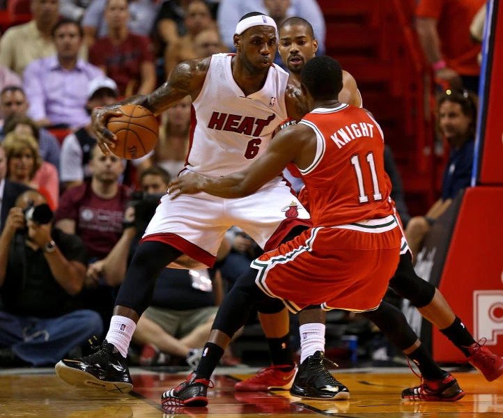 James scores 33 points, Heat roll past Bucks