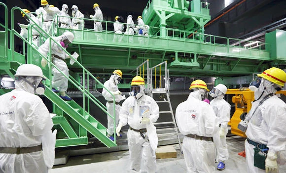 Fukushima operator starts removal of fuel rods