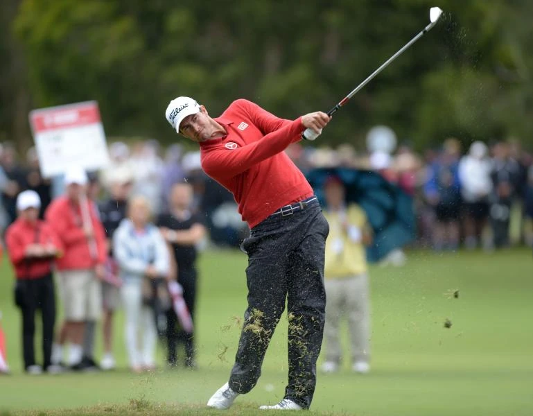 Scott, McIlroy battle at Australian Open