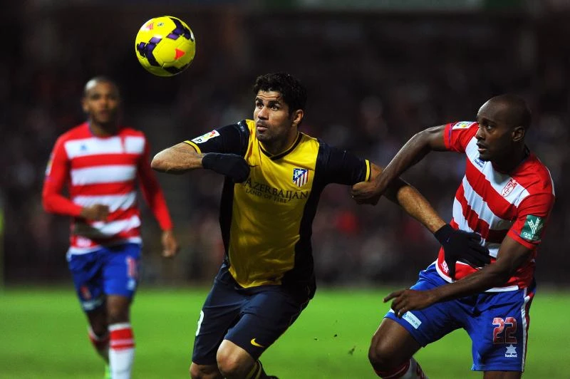 Villa, Costa lead Atletico past Granada in Spain