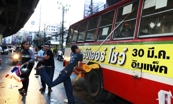 Tensions flare as Thai protesters target PM’s offices