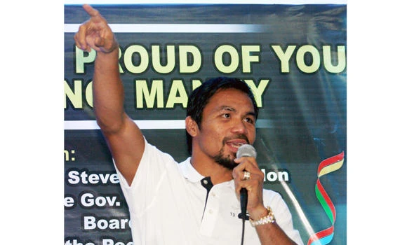 Philippine boxing hero Pacquiao floored in tax fight