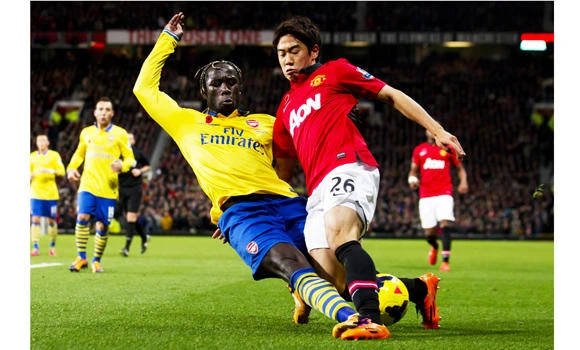 United beats Arsenal to roar back into title race