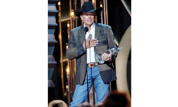 Strait rides away with top country music honor