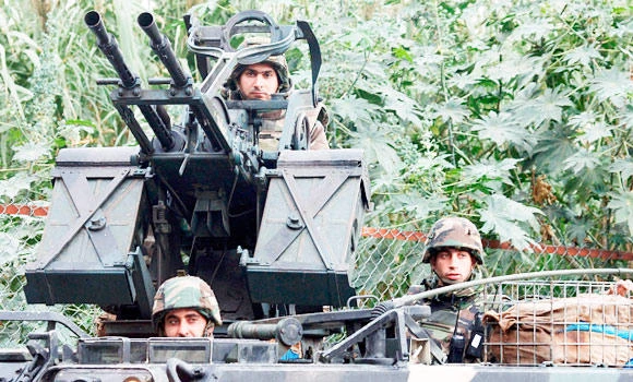 Lebanon Army arrests 21 over violence linked to Syrian chaos