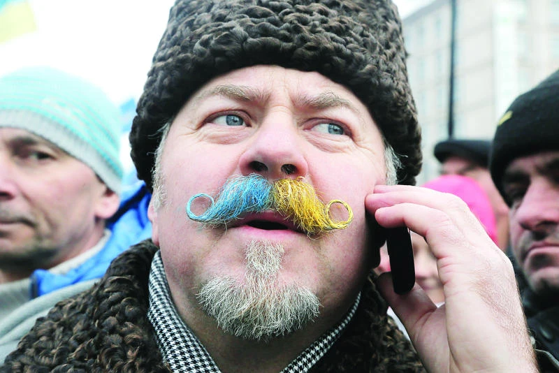 EU suspends talks with Ukraine amid mass rallies