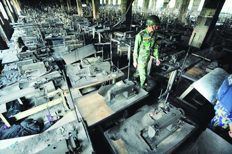 Bangladesh charges 13 over deadly factory fire